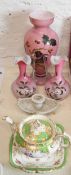 A ceramic hand painted and gilded teapot compete tray. Also, a pair of pink opaque jugs, a vase