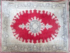 A large Persian carpet. H.360 W.275