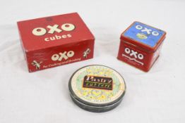 Two vintage Oxo tins and a tine of Ian Logan pastry cutters designed by Ian Beck. H.7 W.17 D.13 cm