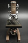 A mid 20th century Propper microscope, Model No. 73333. H.28cm