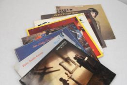 An assortment of eight 12' LPs including The Patti Smith Group.