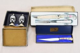 A carving knife and carving set with bone china handles. One made by Coalport and, a pair salter and