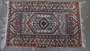 An Eastern style rug. H.130 W.81
