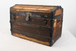 An old metal and timber bound trunk.