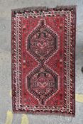 A Shiraz rug. H.136 W.84