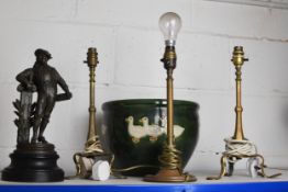 A miscellany to include three brass lamps, a planter and figurine. The planter is decorated with