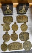 A collection of 13 horse brasses and plaques mostly from Malvern Tractor Fairs H.8 W.15 cm.