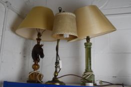 Three table lamps metal and marble stems. H.63 x W.44 cm.