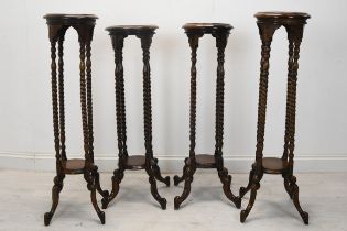 A set of four 19th century style mahogany jardiniere stands on barley twist supports. H.104 W.32 D.