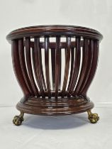 Jardiniere, 19th century style mahogany on brass ball and claw supports. H.36 W.40 D.40cm.