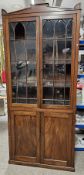 Bookcase, Regency flame mahogany with astragal glazed upper section. (One pane missing). H.210 W.
