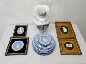 Four Wedgwood plaques plus plates and a vase.