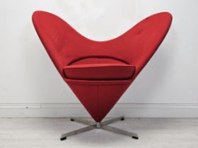 A Heart Cone chair after a 1950s design by Verner Panton for Vitra. H.91 W.108 D.60cm. (Some