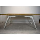 A contemporary oak topped dining table on painted base. H.79 W.200 D.100cm.