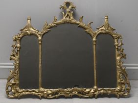 A small gilt metal overmantel mirror in the Chinese Chippendale style. H.70 W.80cm.