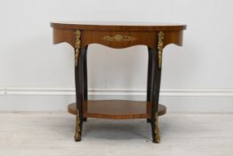 Lamp table, Louis XV style in burr walnut and crossbanded with ormolu mounts. H.47 W.58 D.37cm.