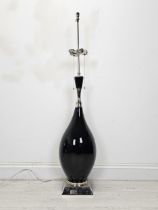 A large contemporary lamp, extending of Eastern baluster shape. H.127cm. (unextended)