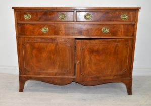 A Georgian style flame mahogany dwarf sideboard. H.102 W.138 D.51cm.