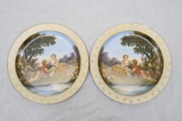 After Francois Boucher Shepherd, two transfer printed and hand painted china plates with gilded