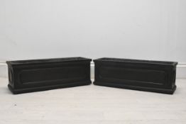 A pair of 19th century style faux lead planters, modern in fibreclay. H.18 W.50 D.16cm.