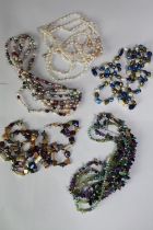 A collection of five mixed cultured pearl necklaces, including a multi strand pearl, amethyst,