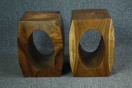 A pair of stools or pedestals in an Eastern hardwood. H.46cm. (each)