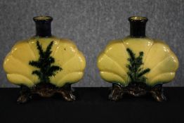 Royal Art Pottery. A pair of hand coloured porcelain vases. each measures H.21 W.20 cm.