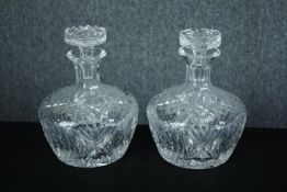 A pair of matching crystal glass decanters. H.20 cm. (each)