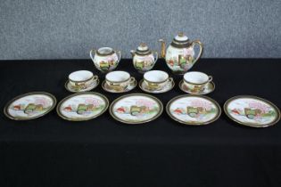 A late 20th century Japanese egg shell hand painted tea set. Incomplete. With a teapot, sugar