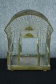 A vintage metal birdcage with a glazed door. H.42 W.33 D.24 cm.