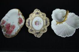 Three platters of varied designs. One made by Limoges with gilt handle and divided into three