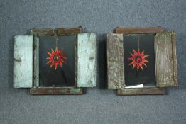 Two cased and distressed style mirrors. Each decorated with a hanging star. H.62 W.49cm. (largest)