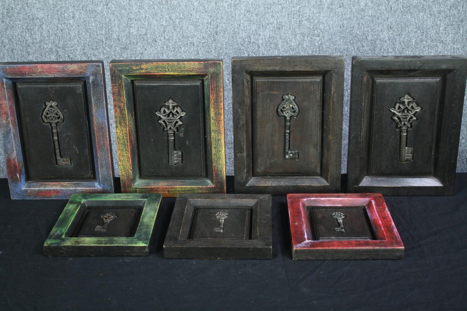 Seven framed decorative keys. H.30 W.23 cm. (largest)