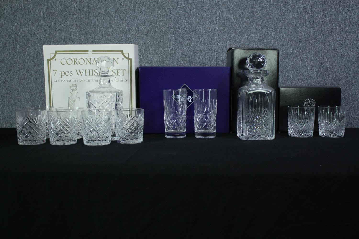 A collection of cut crystal, including a boxed Stuart crystal decanter and two whisky tumblers along
