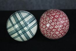 Two ceramic carpet bowls. Each with a diameter of 8 cm. Probably Victorian.