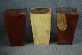 Three stools or pedestals cut from exotic hardwood timber. H.50cm. (each)