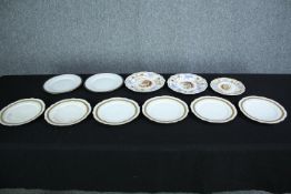 A mixed collection of eleven plates including Limoges, Philippe Deshoulieres. Dia.22cm. (largest)