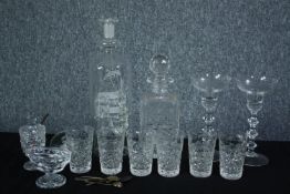 A collection of cut glass and crystal, including a crystal decanter, six crystal drinking glasses