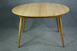 Dining table, contemporary G-Plan style, elm and beech with integral central extension leaf. H.76