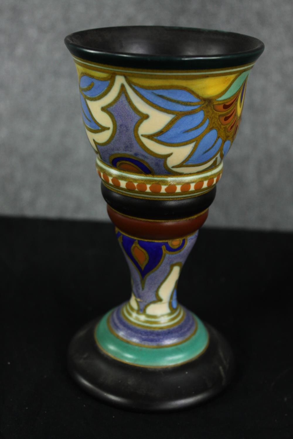 A 1930's Gouda pottery Plazuid Holland “Madeleine” pattern hand painted ceramic vase with twin - Image 2 of 5