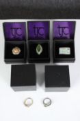 Five boxed silver and gemstone dress rings, set with opal, ammolite, tanzanite and orange