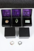 Five boxed silver and gemstone dress rings, set with opal, ammolite, tanzanite and orange