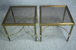 Pair of vintage brass lamp tables with smoked glass tops. H.43cm W.46cm