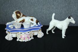 A 19th century hand painted French porcelain desk pen stand and ink well in the form of a bullmastif