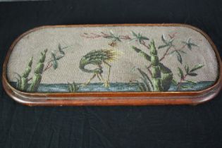 A 19th century mahogany framed bead stitched tray. L.61 W.27cm.