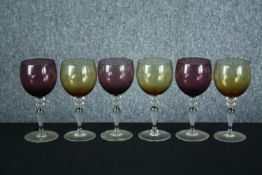 A set of six vintage stemmed wine glasses. H.20cm.