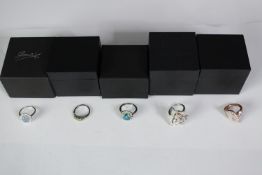 Five boxed silver and gemstone dress rings, set with black opal triplet, mystic topaz, peridot and