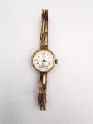 A Vintage ladies automatic Limit 9ct gold cocktail watch with sprung bracelet and octagonal face,