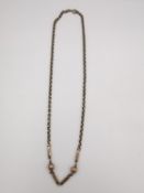 A Victorian 9ct rose gold chain with ball and bar design to the front, the rest of the chain rolo