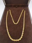 A boxed 9ct yellow gold rope twist chain with secure C-sprung clasp. Hallmarked:375, Italy. L.50cm
